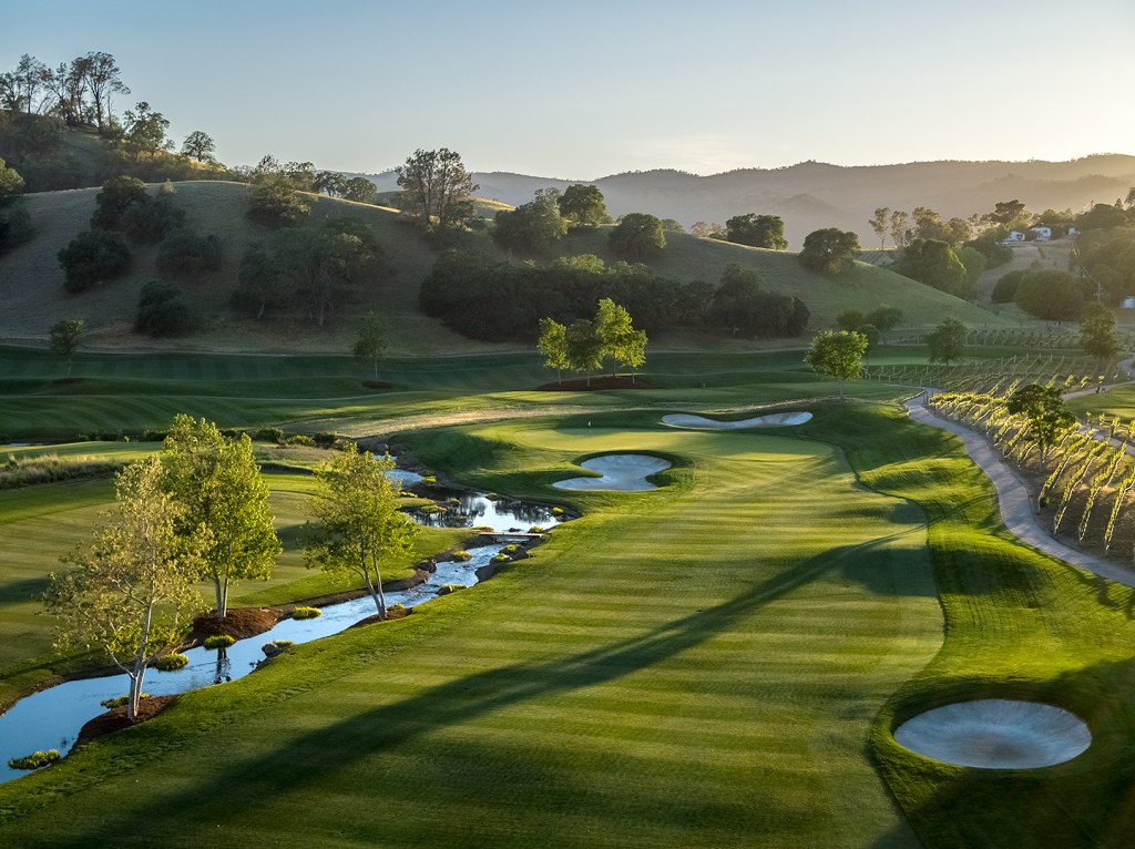 View of golf course with river