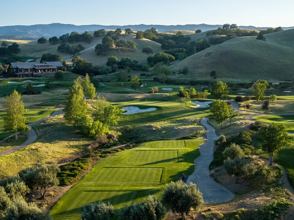 View of golf course and mountains