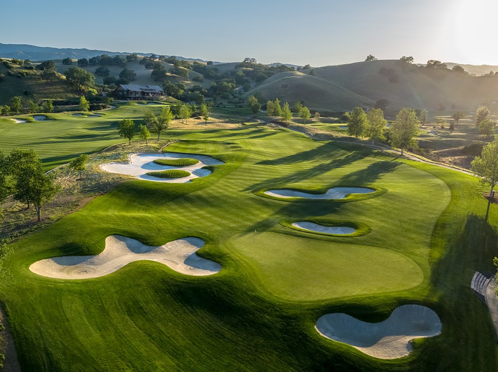 Aerial view of golf course with sand traps